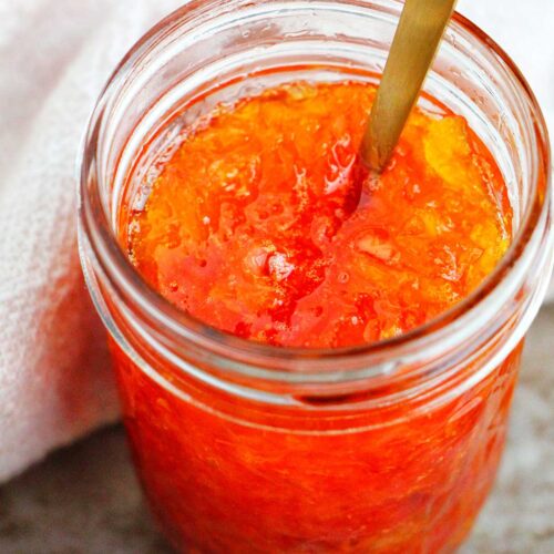 orange jam in a jar.