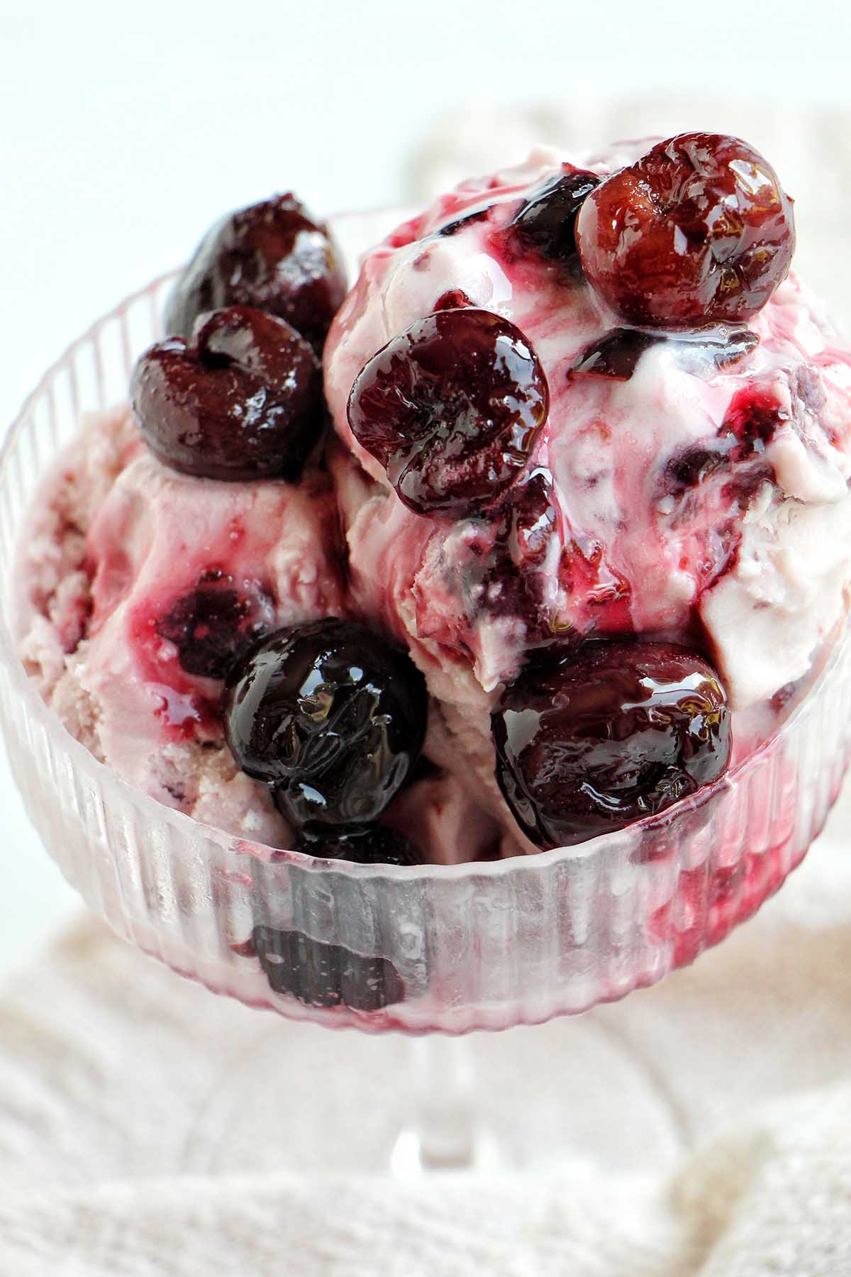 black cherry ice cream in coupe glass.