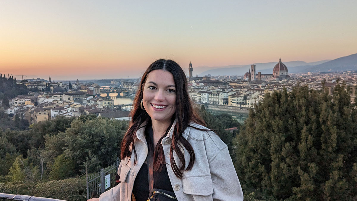 girl standing in front of Florence skyline.