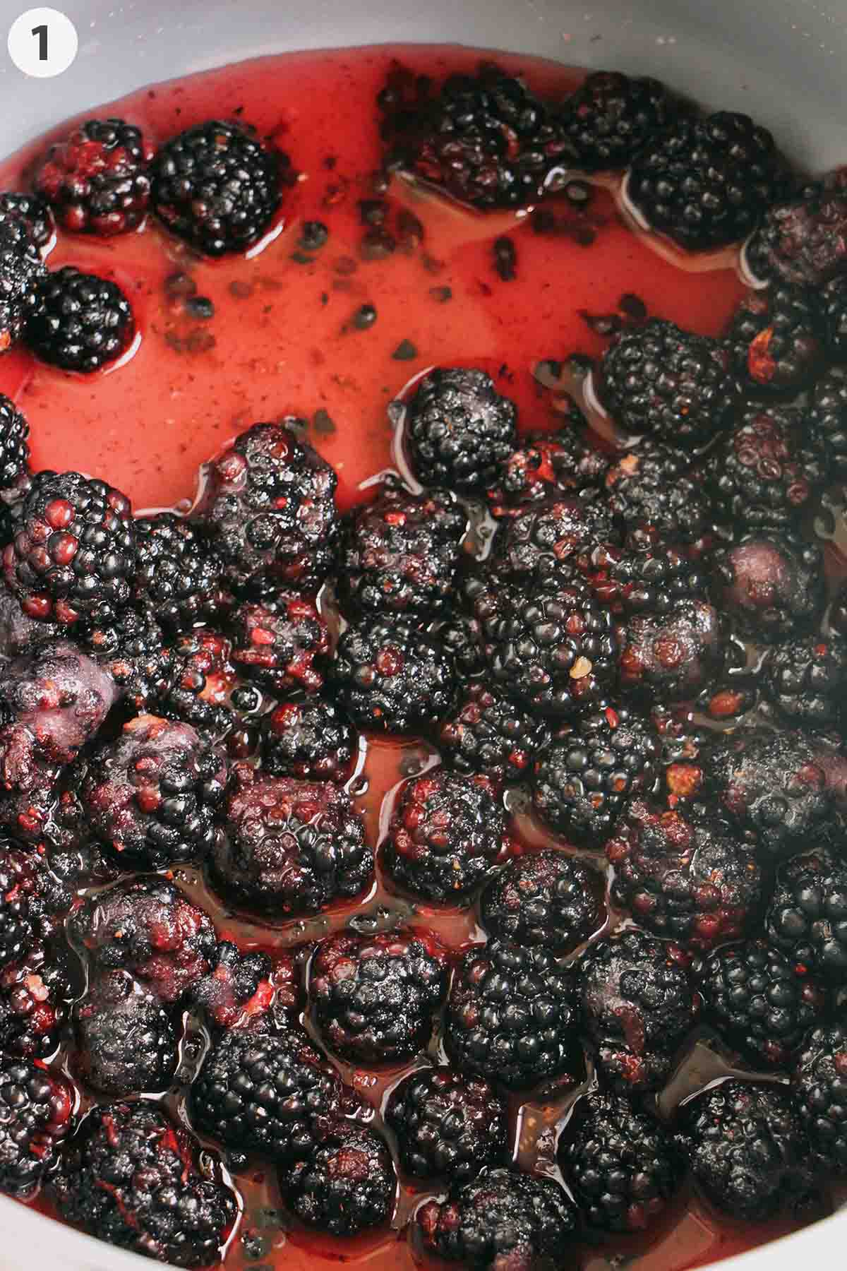 numbered photo showing blackberries cooking in a saucepan.