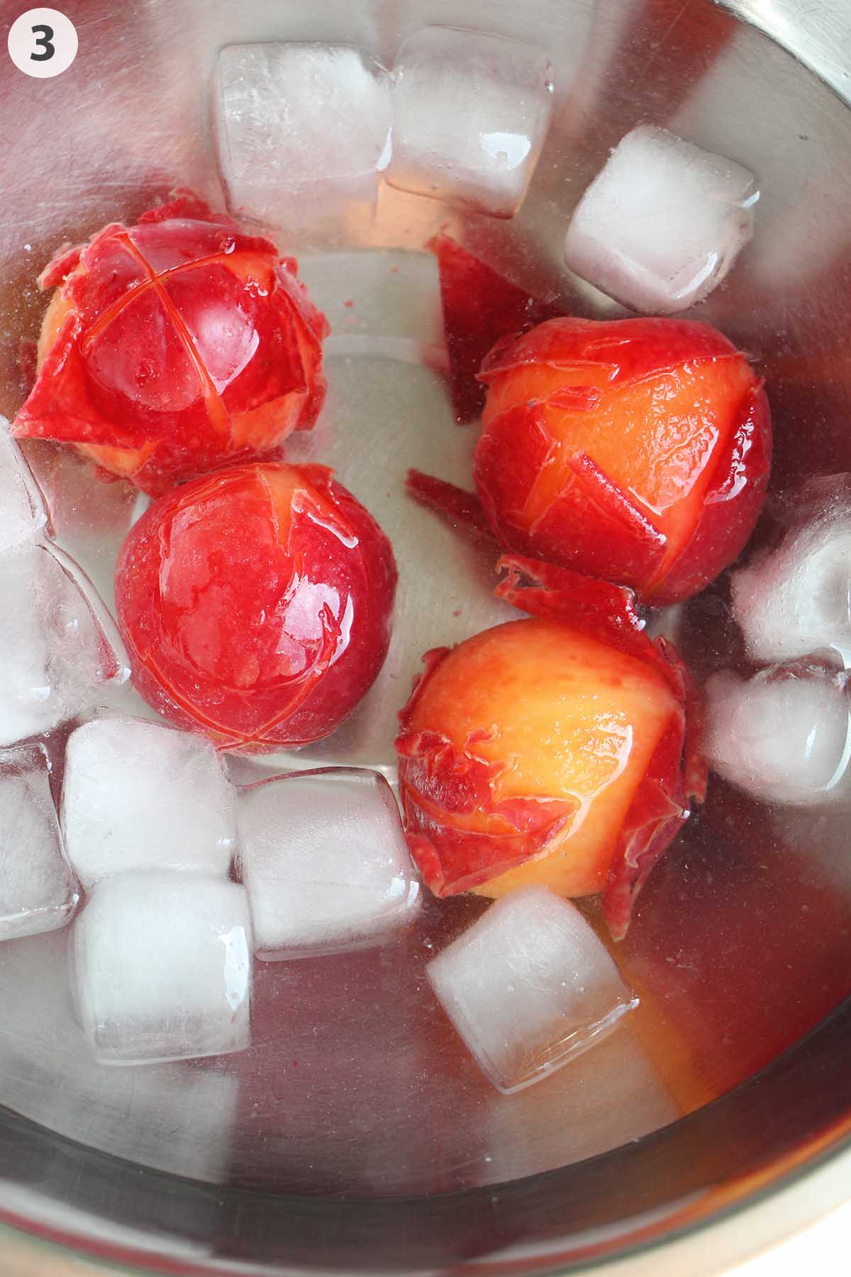 numbered photo of plums in ice bath.