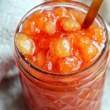 nectarine jam in a mason jar.