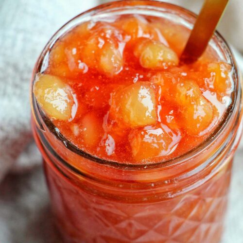 nectarine jam in a mason jar.