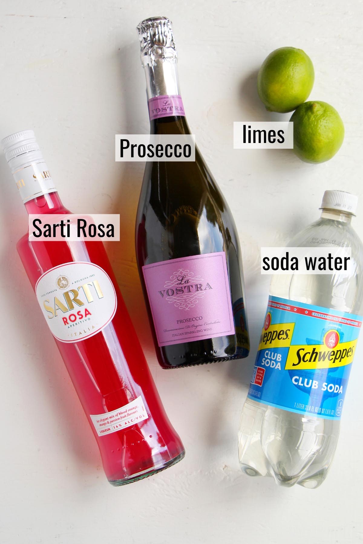 Sarti spritz ingredients with labels.