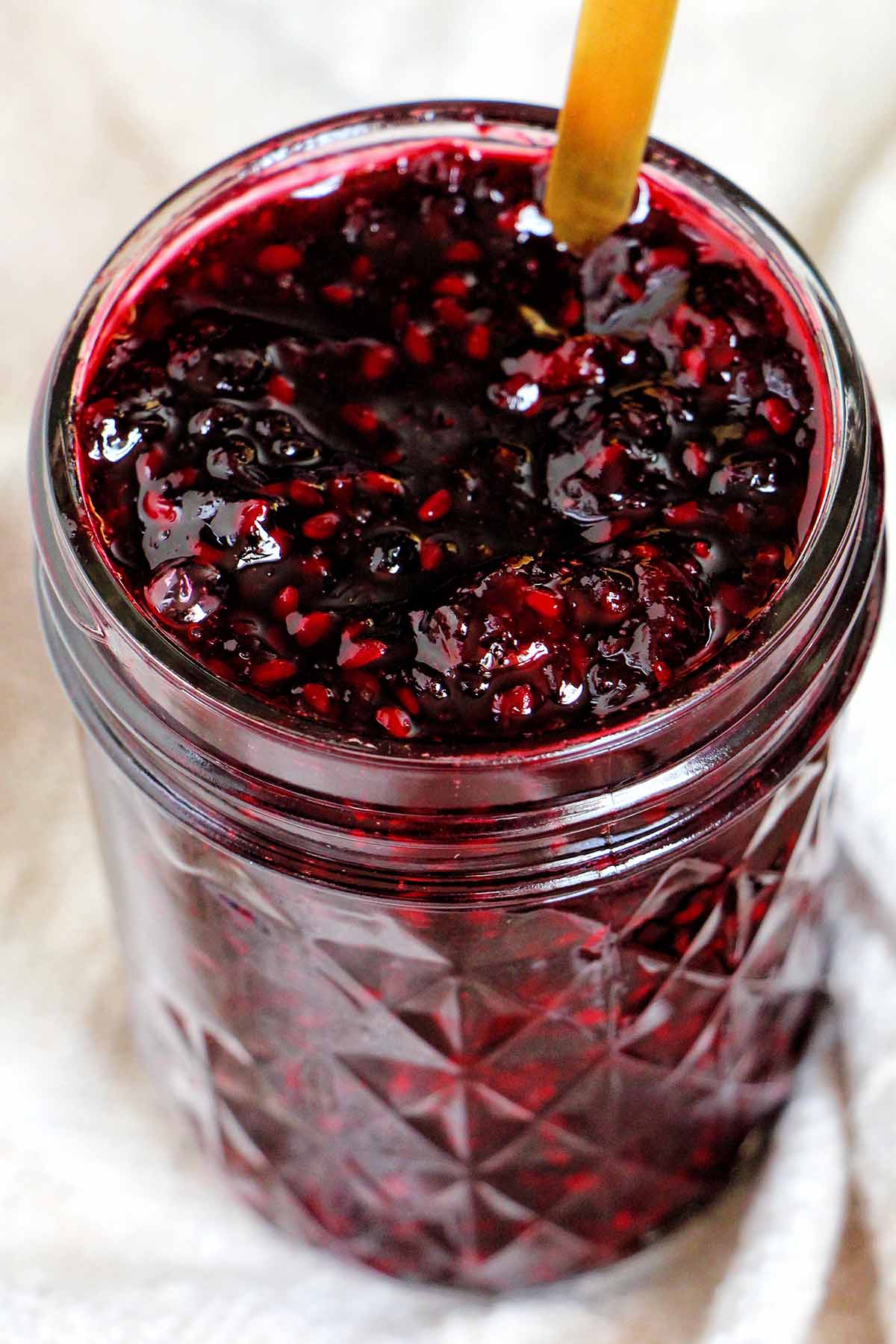 blackberry jam in a mason jar.
