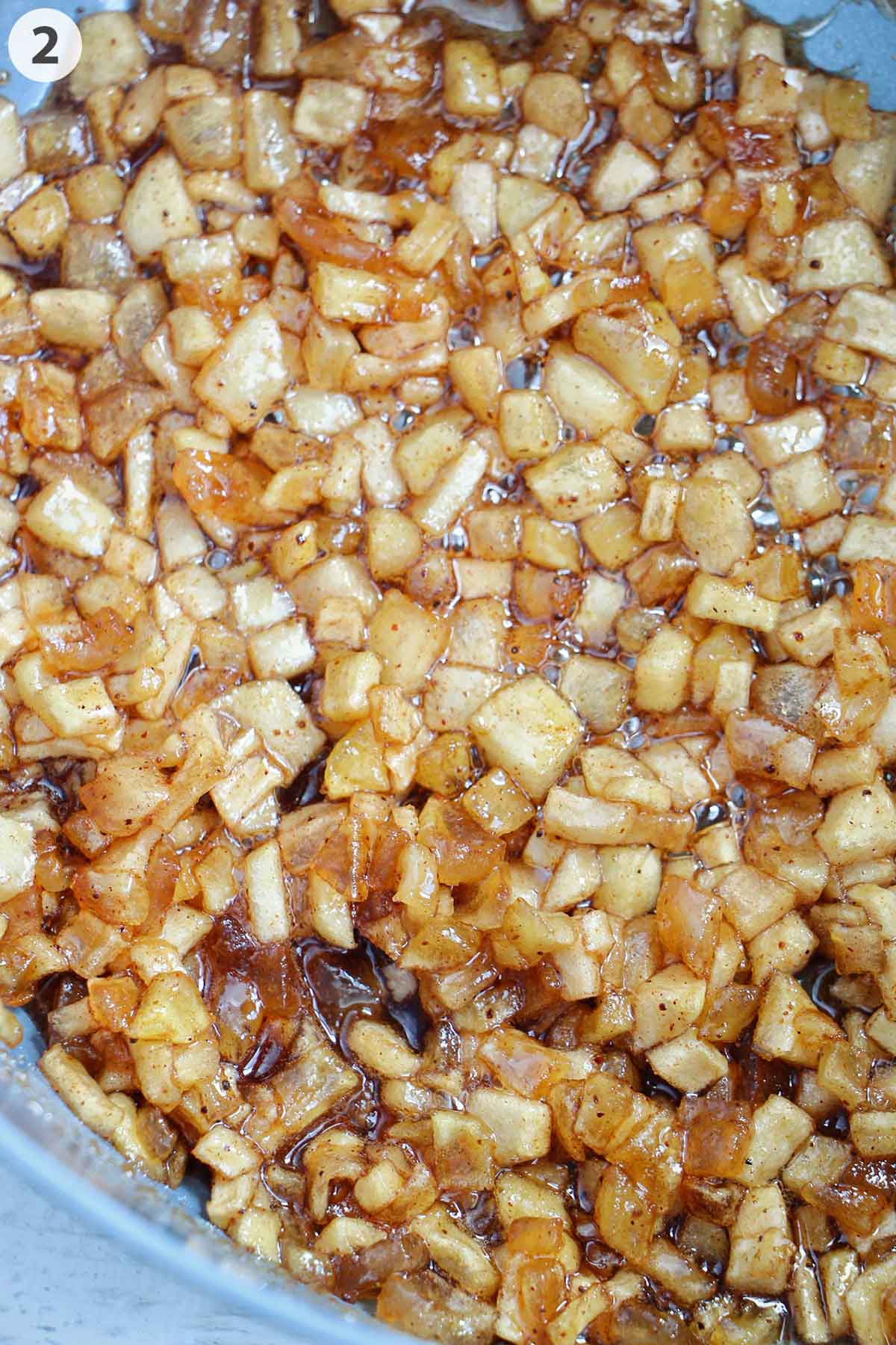 numbered photo of apple jam cooking until thickened in pot.
